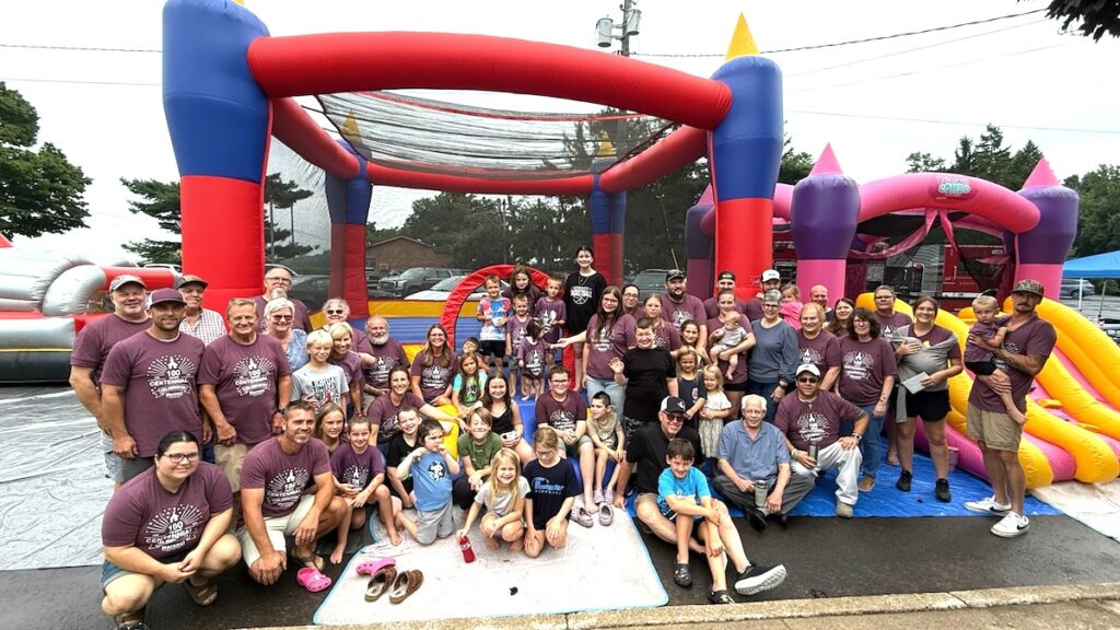 Morenci Church of the Nazarene members braved the rain for a block party on Aug. 15, part of a weekend of celebrating the church’s centennial. The church’s story began with a small group meeting in a home on Walnut Street.