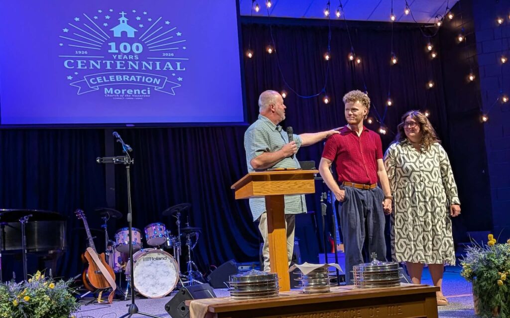 Pastor Vince Flippo welcomes Morenci Church of the Nazarene’s new youth pastor, Jacob McMunn, and his wife, Maya.